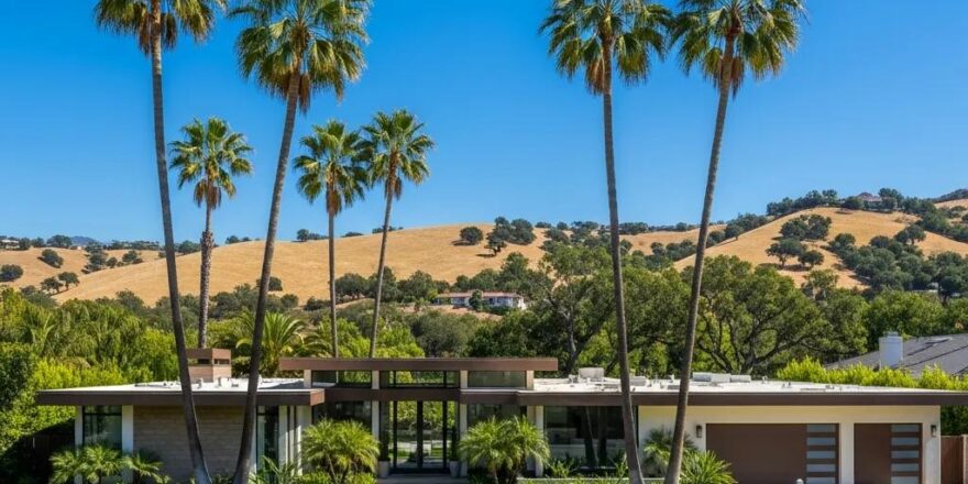 California real estate landscape with a modern home and palm trees